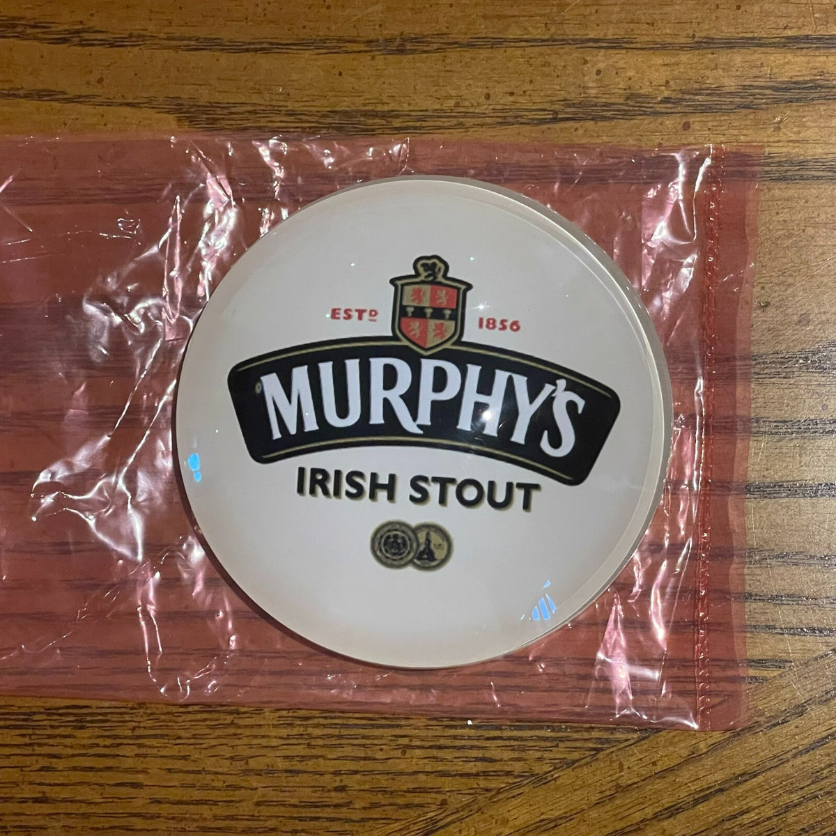 Murphy's badge in its packaging