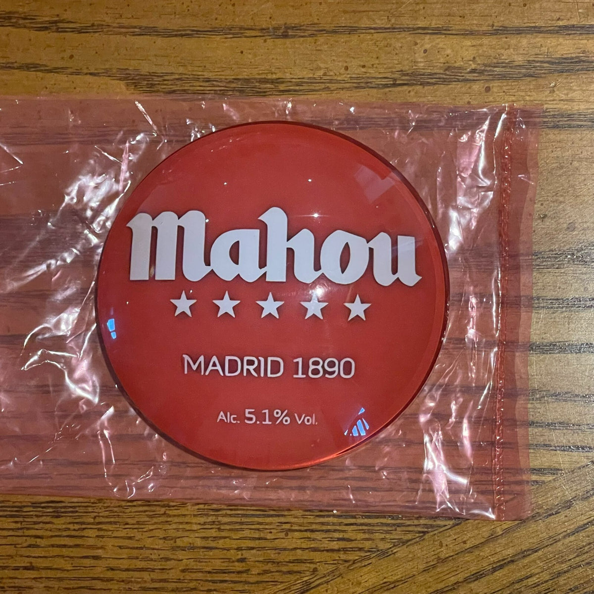 Mahou badge in its packaging