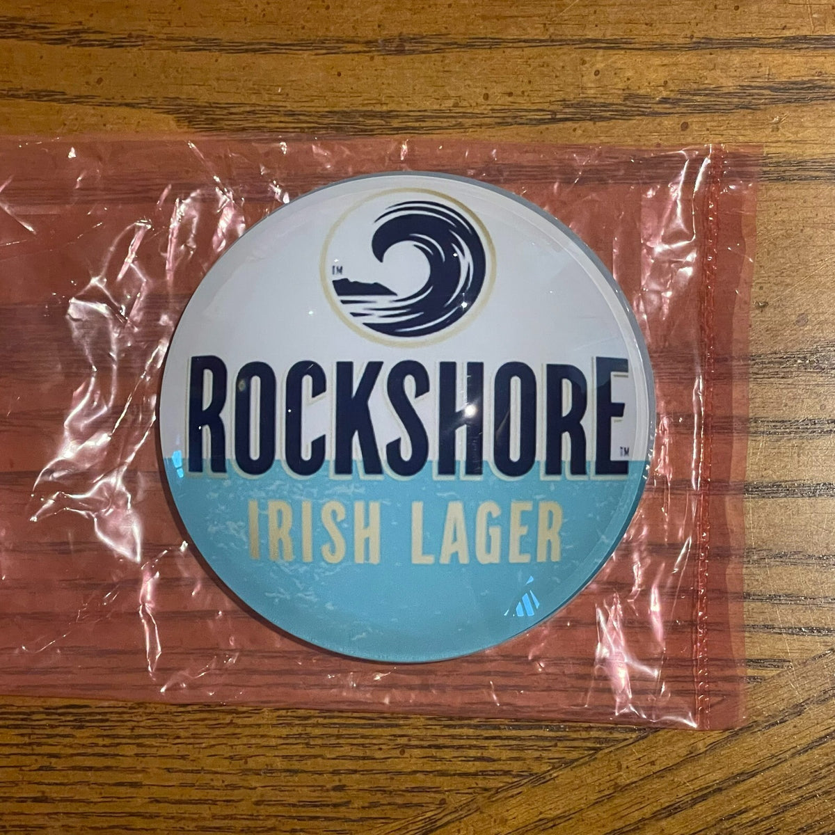 Rockshore Irish Lager badge in its packaging