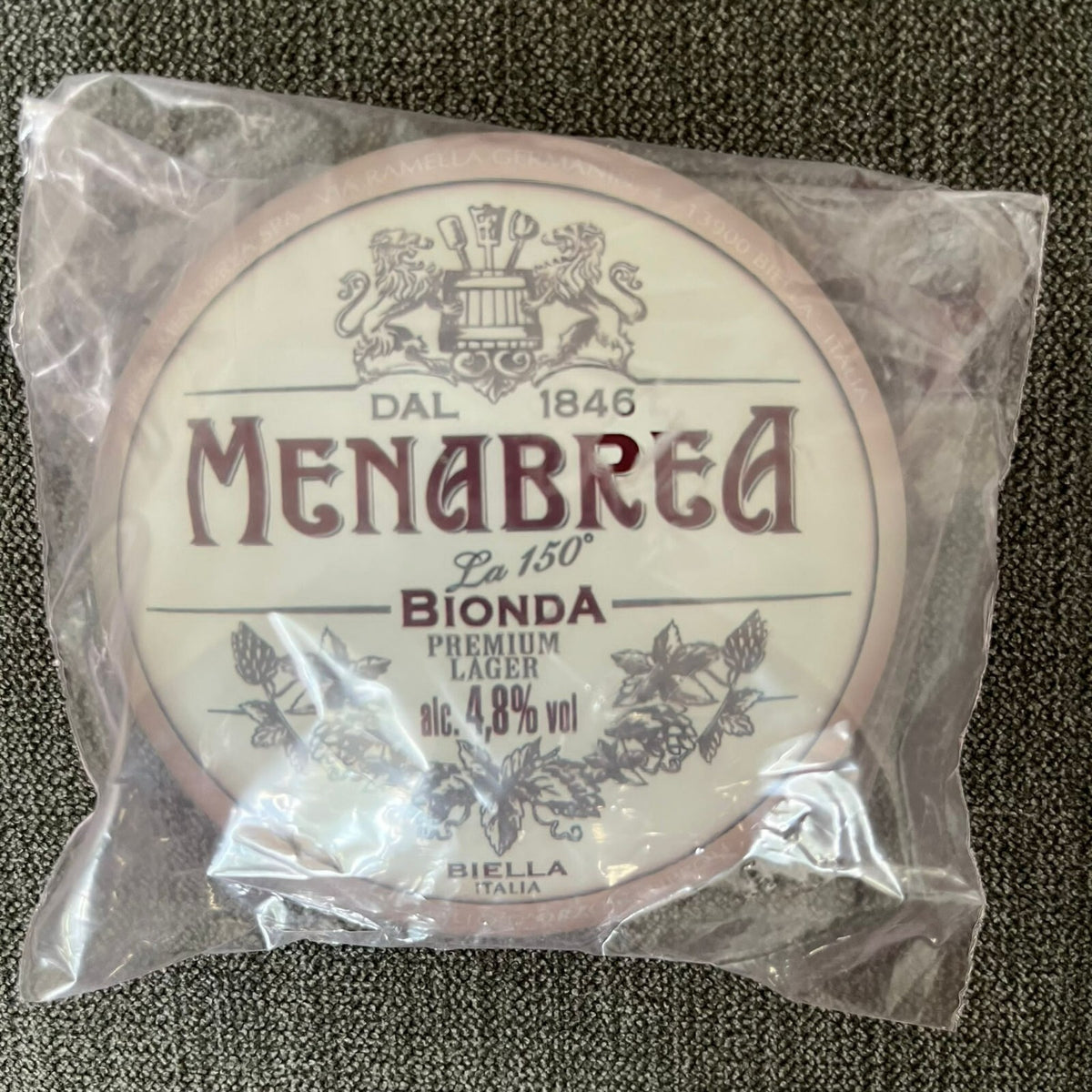 Menabrea badge in its packaging