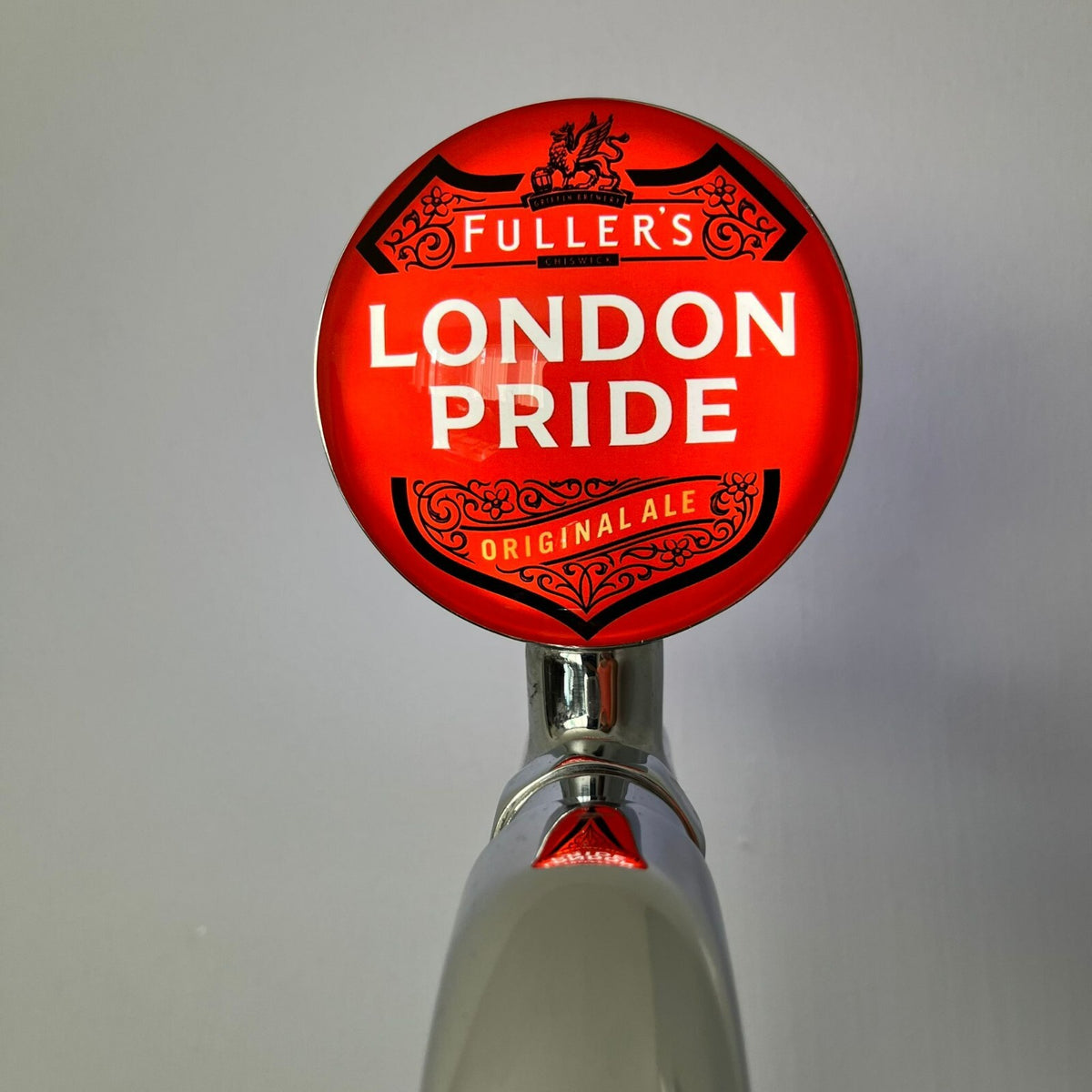 London Pride badge lit up on a beer tap