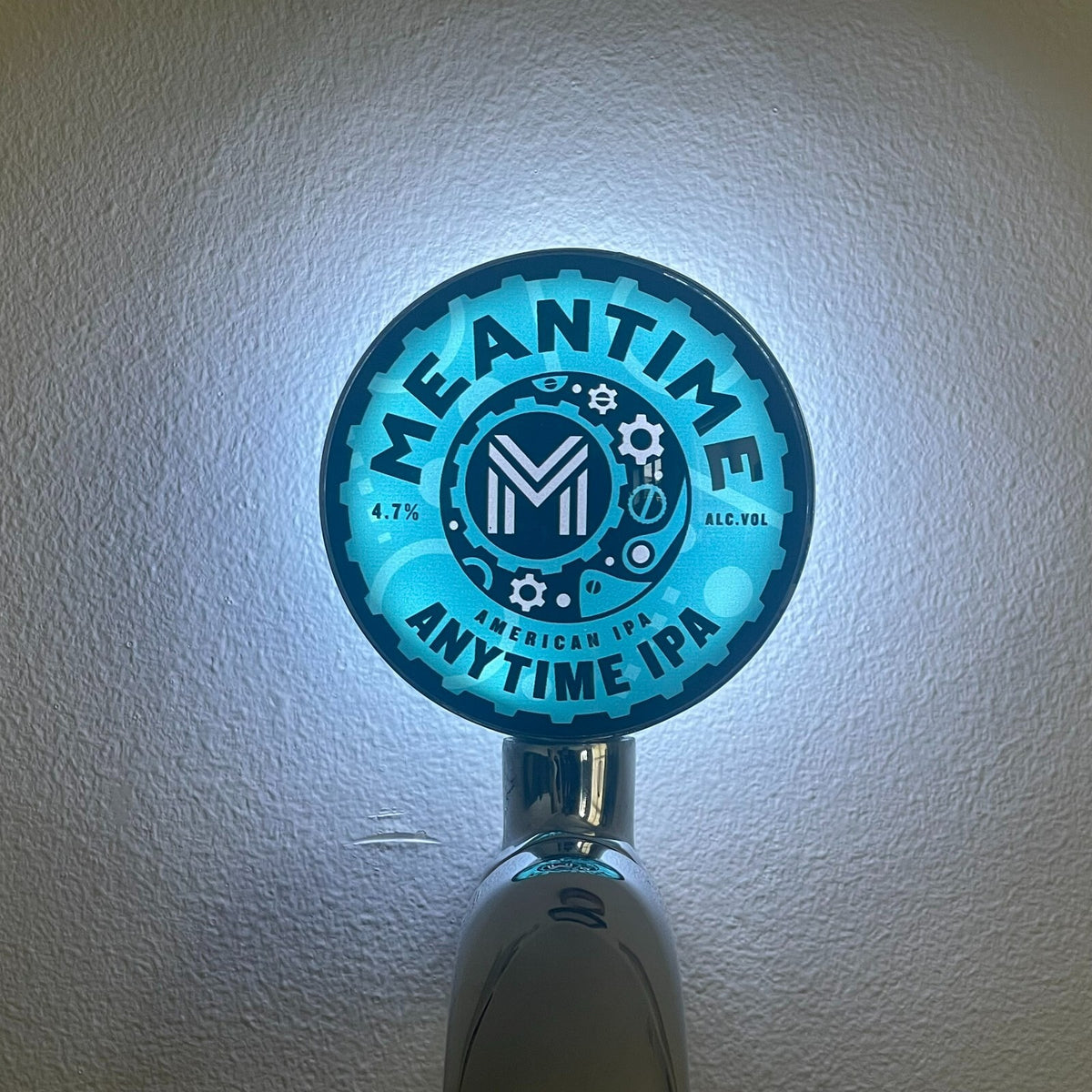 Meantime Anytime IPA badge lit up on a beer tap