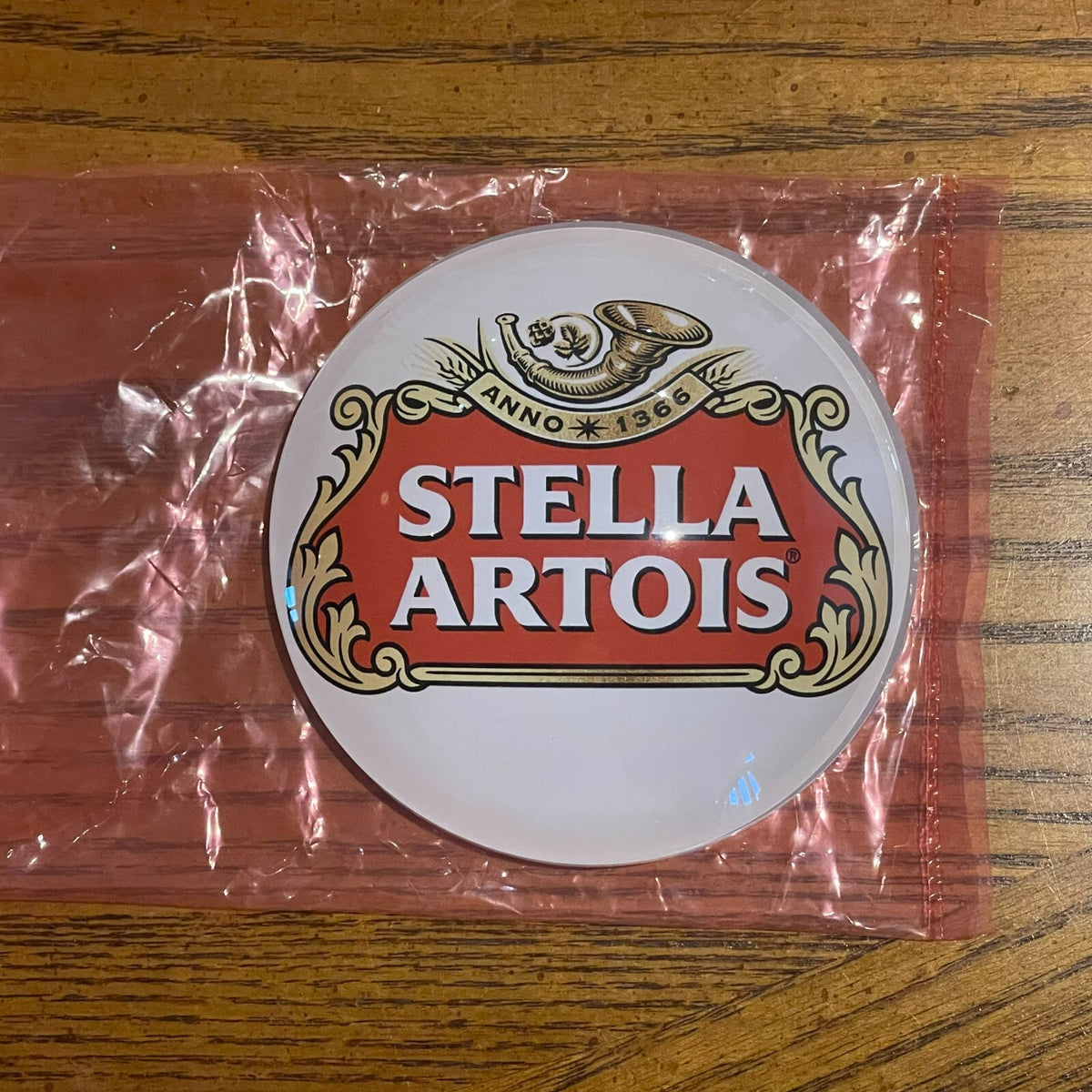 Stella Artois badge in its packaging