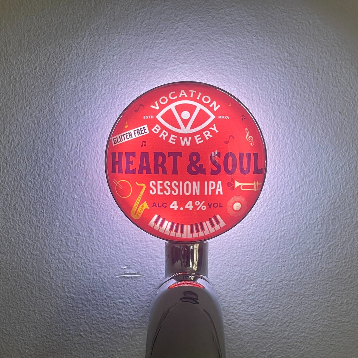 Vocation Heart & Soul badge lit up on a beer tap