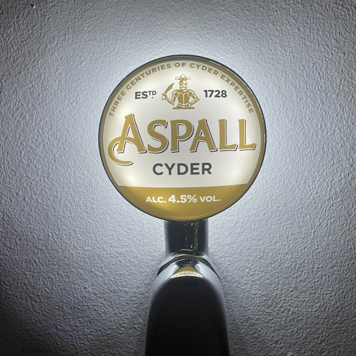 Aspall Cyder badge lit up on a beer tap