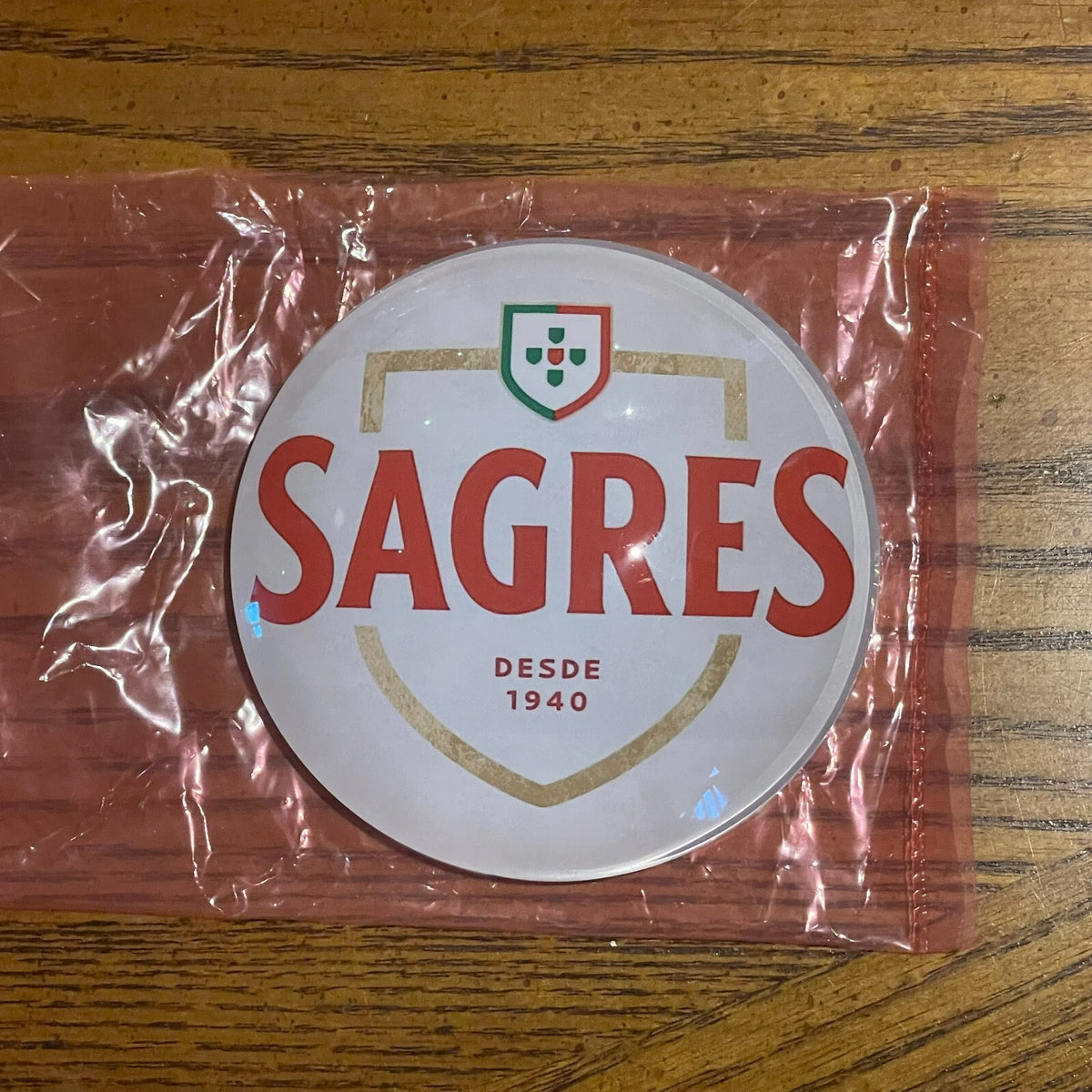 Sagres badge in its packaging