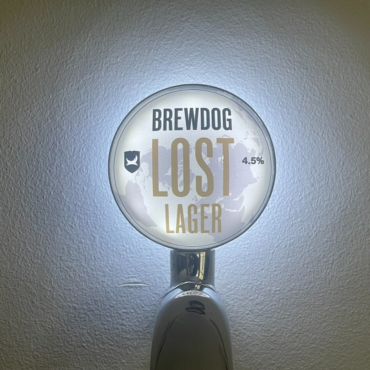 BrewDog Lost Lager badge lit up on a beer tap
