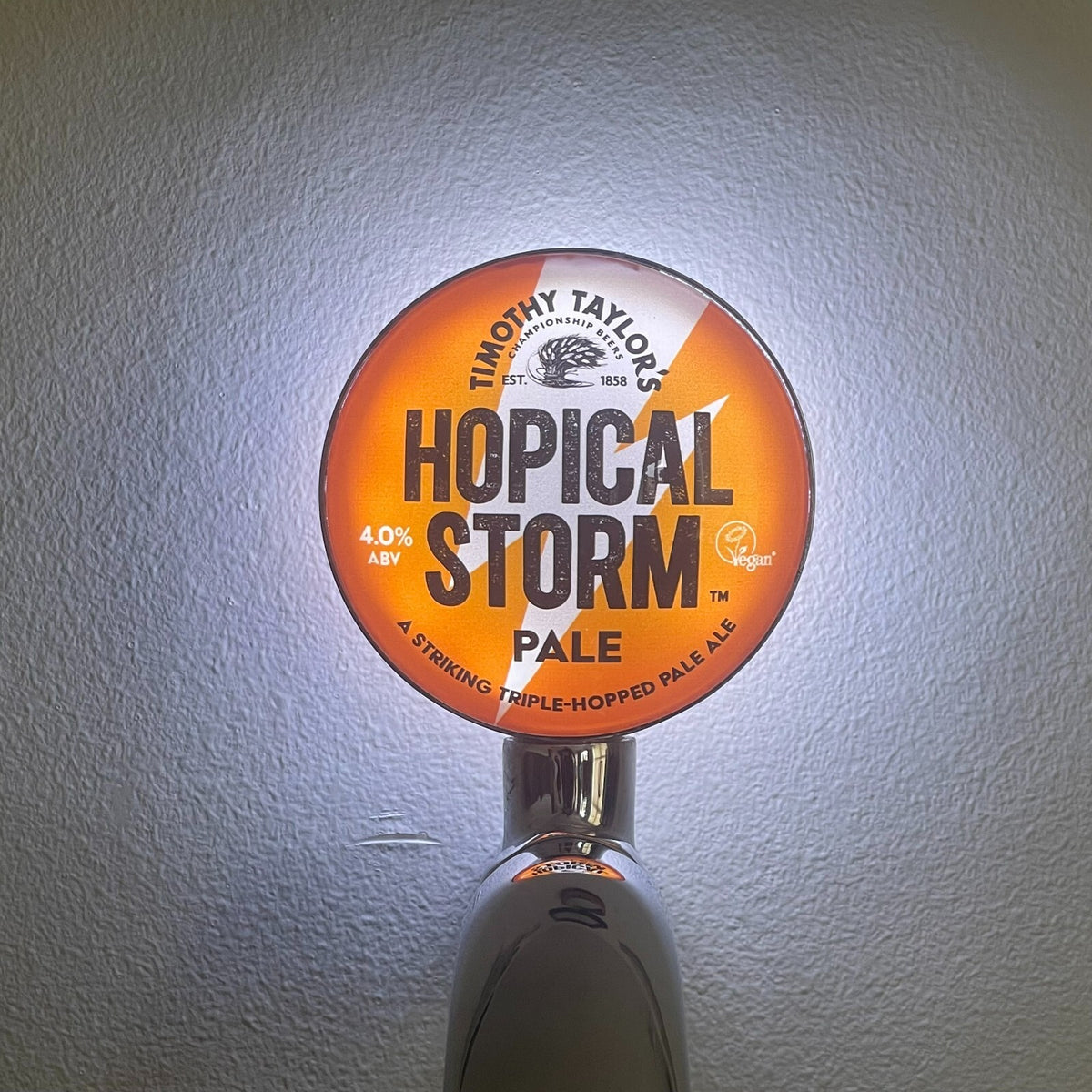 Hopical Storm badge lit up on a beer tap