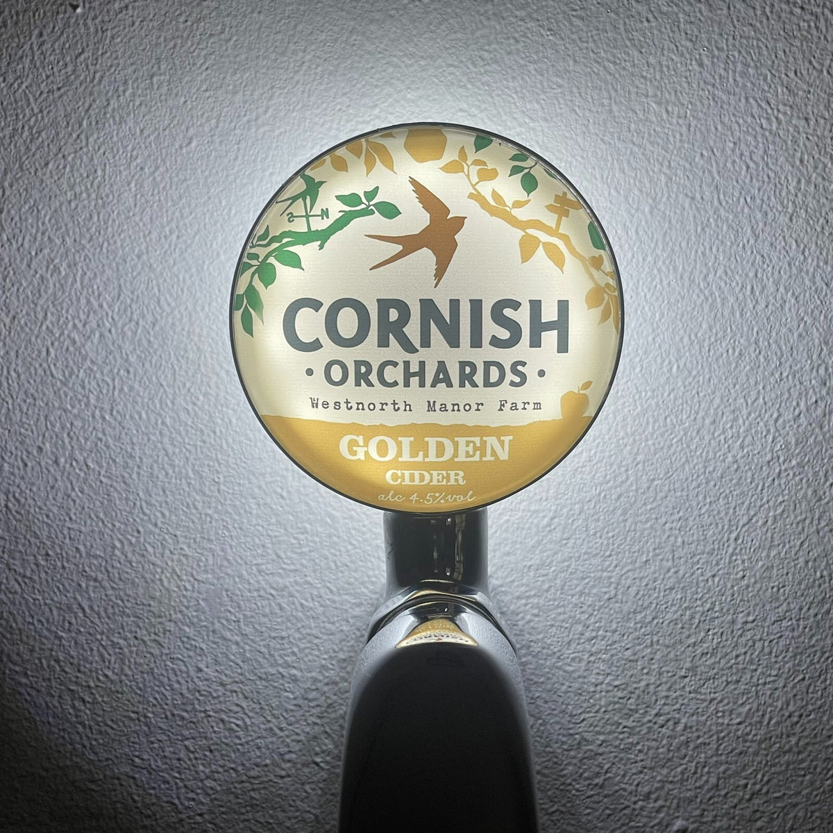 Cornish Orchards badge lit up on a beer tap