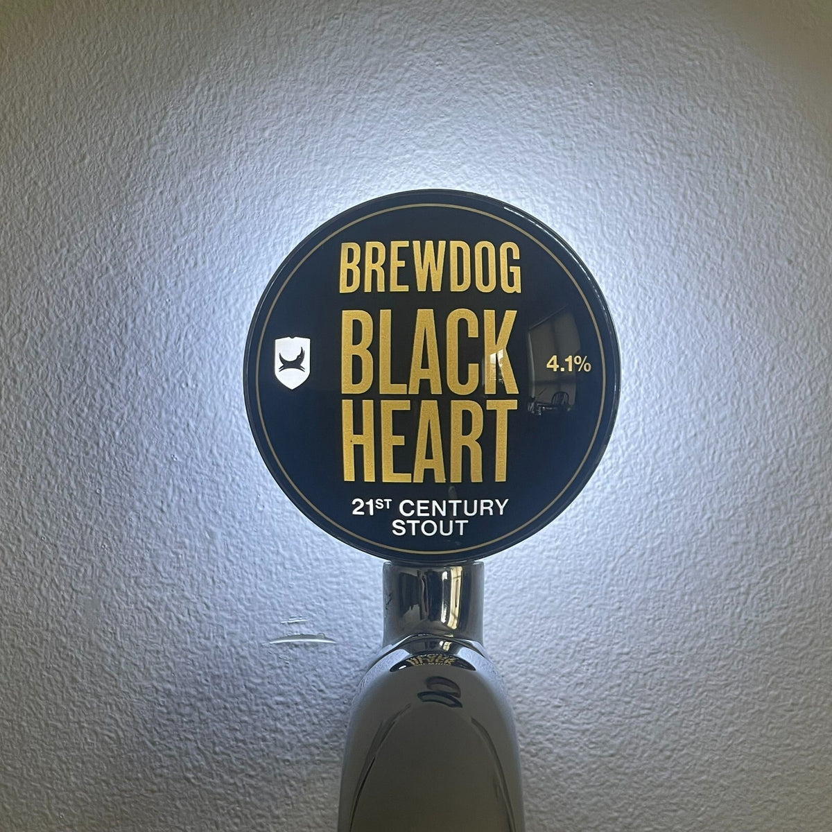 BrewDog Black Heart badge lit up on a beer tap