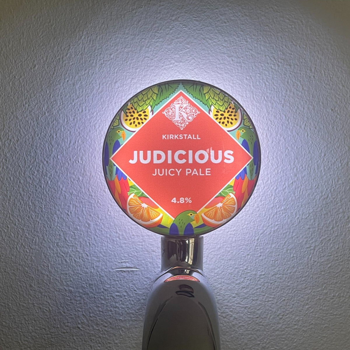 Kirkstall Judicious badge lit up on a beer tap
