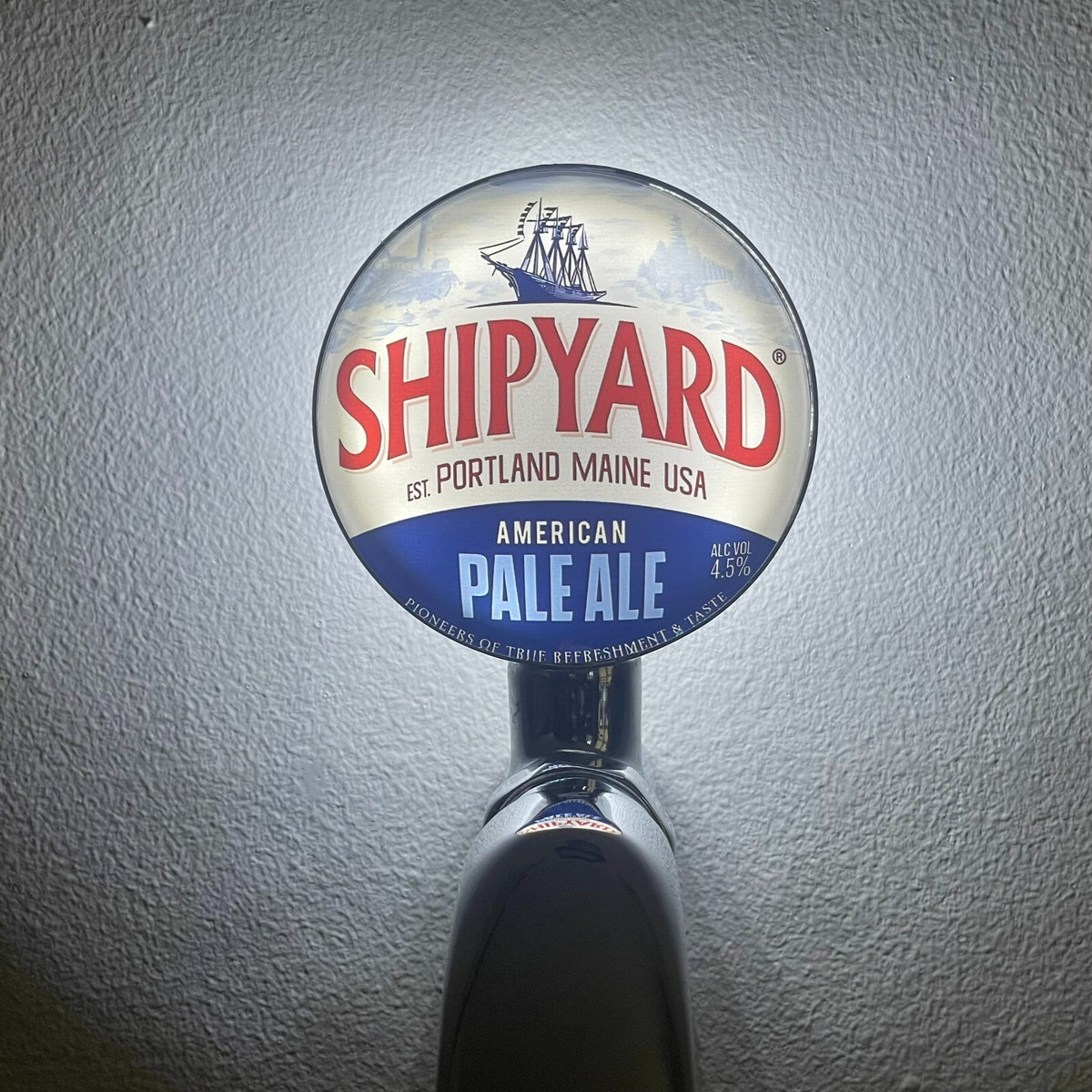 Shipyard Pale Ale badge lit up on a beer tap