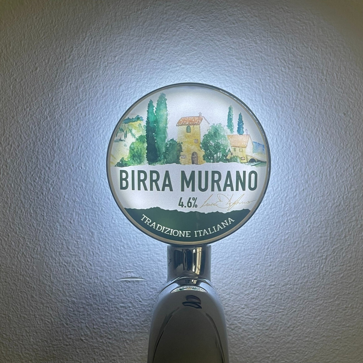 Birra Murano badge lit up on a beer tap