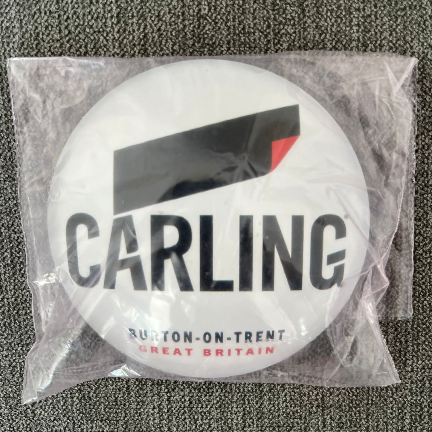 Carling Badge / Lens