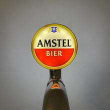 Load image into Gallery viewer, Amstel Badge / Lens
